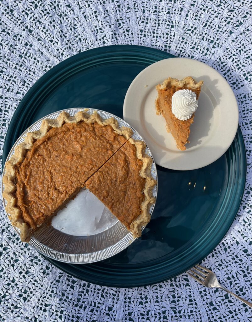 Sweet potato pie with slice